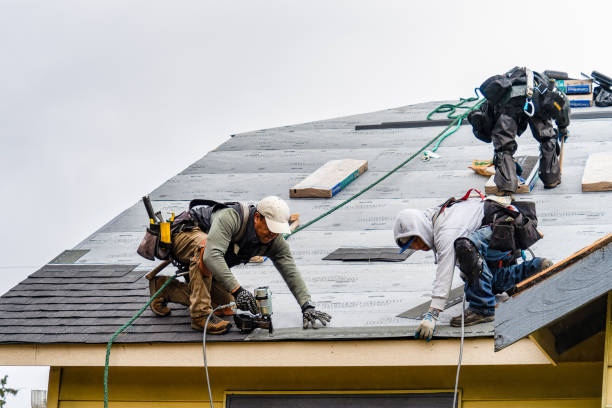 Professional Gutter Installation technician working in Herminie, PA